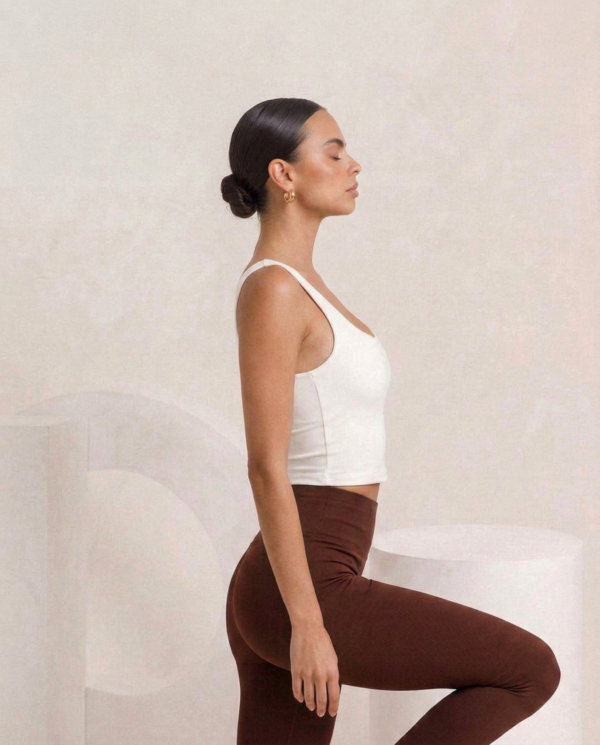 White tank and brown flare, side, eucalyptus fibre activewear by WEARTH India White tank and brown flare, side, eucalyptus fibre activewear by WEARTH India