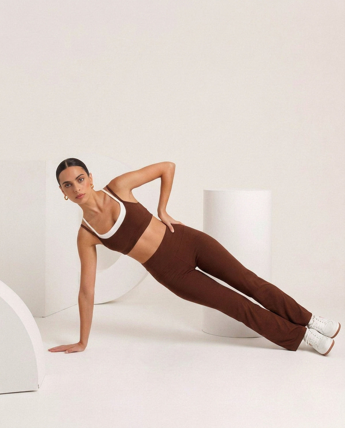 Brown bralette and flare, side plank, eucalyptus fibre activewear by WEARTH India