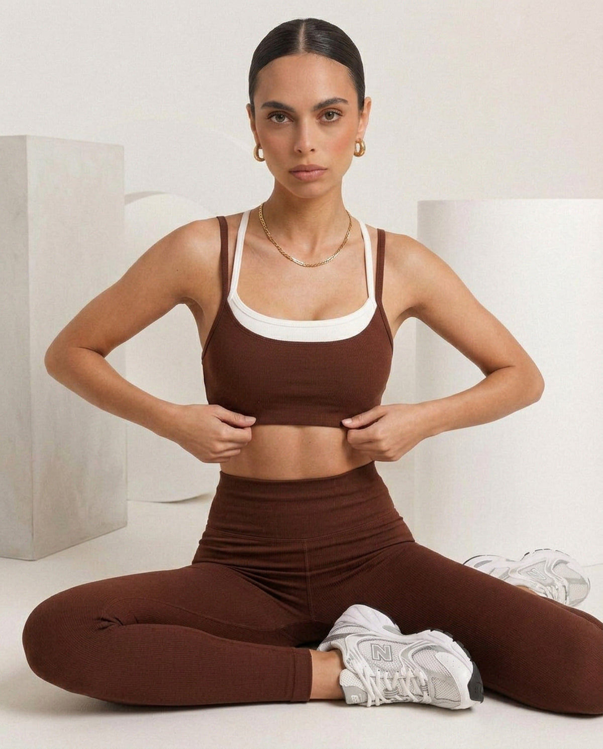 Brown bralette and flare, seated, eucalyptus fibre activewear by WEARTH India