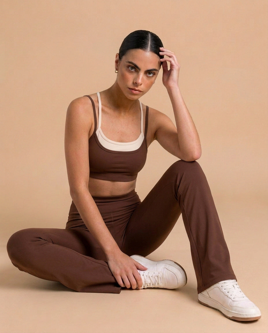The Heartwood Set in brown, double-layer bralette and flare leggings, seated, eucalyptus fibre activewear by WEARTH India